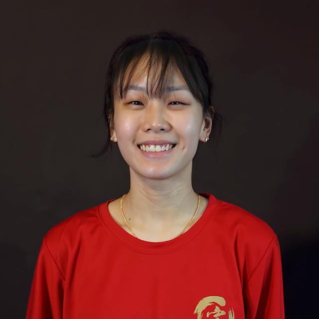 Coach Zoe Mui, the youngest in the Xuan coaching family, brings remarkable experience as a former National Youth and Team Singapore athlete. A SEA Games gold medalist in Changquan (2015), she combines her competitive expertise with a deep understanding of Wushu training to help her students reach new heights in performance and confidence.